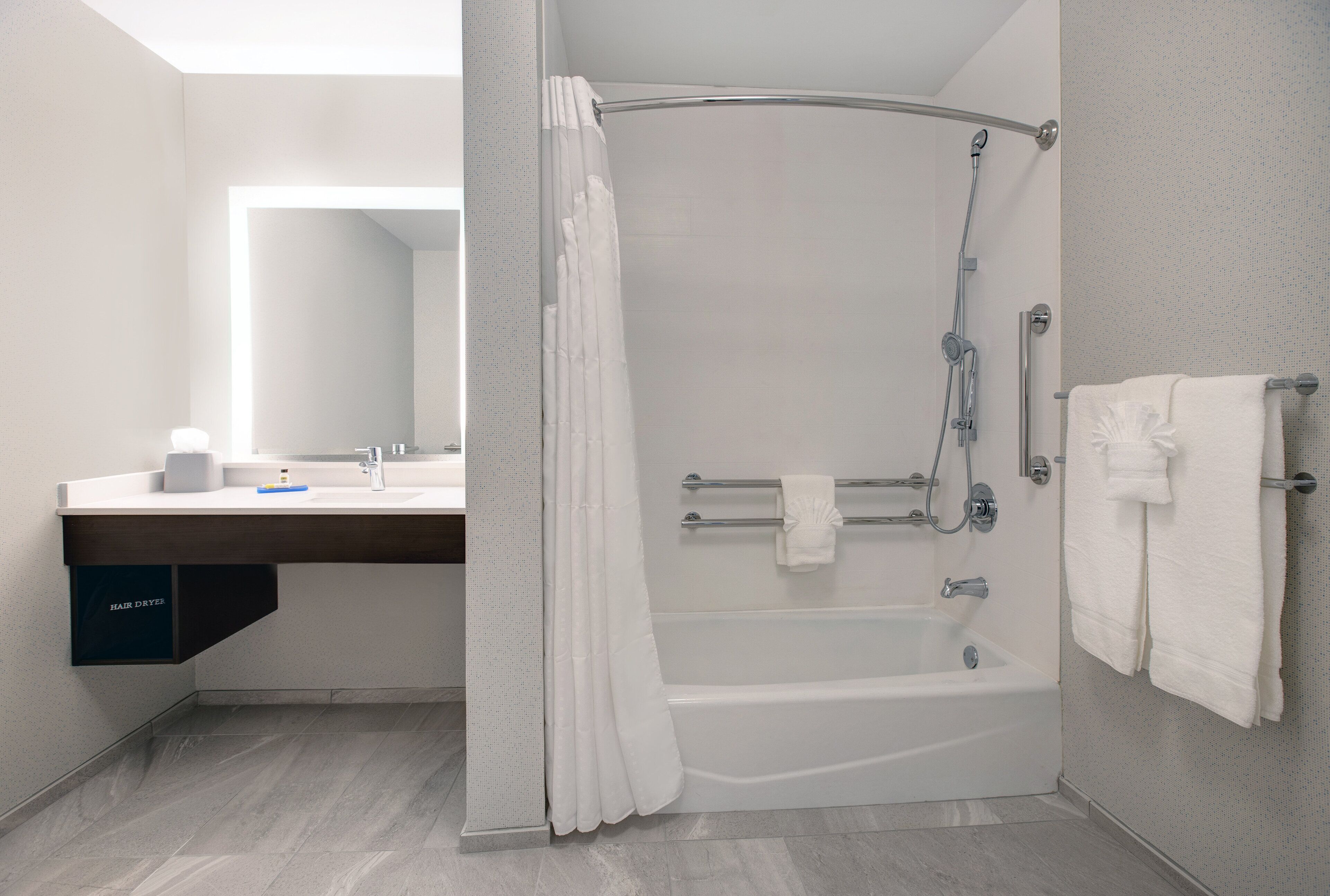 combined shower/bathtub, free toiletries, hair dryer, towels