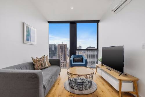 1 Bedroom Apartment City View | Living area | 50-inch flat-screen TV with digital channels, TV