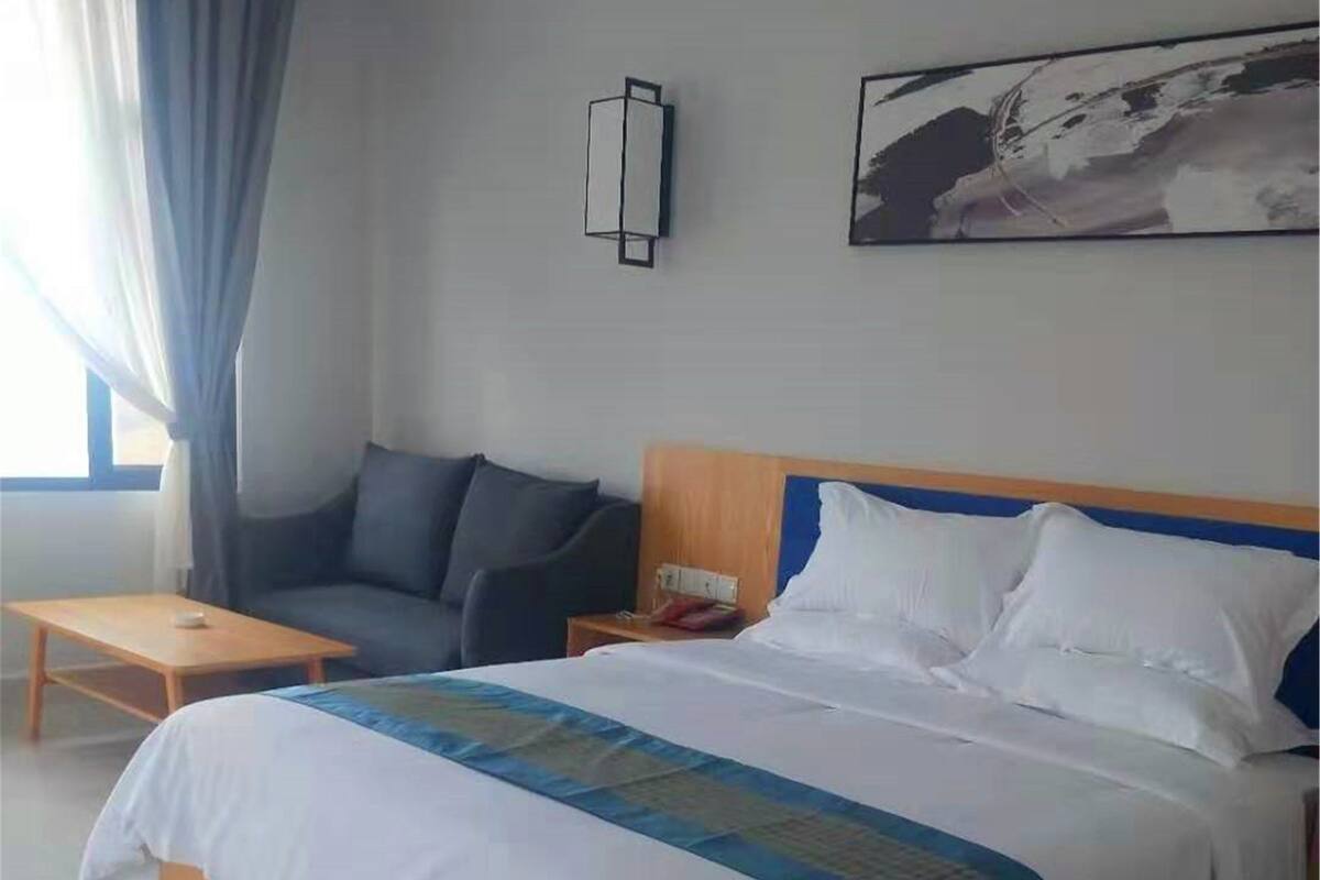Habitación Business | Caja fuerte, cortinas opacas, wifi gratis y ropa de cama