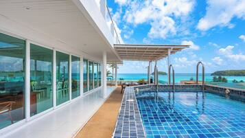 Outdoor pool, open 10:00 AM to 10:00 PM, sun loungers