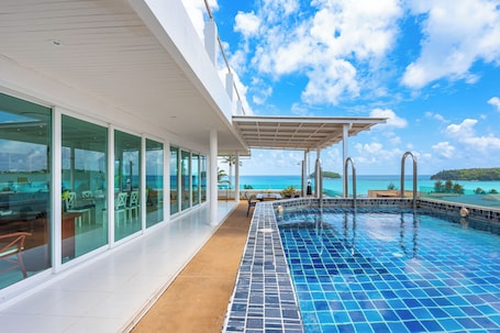 Outdoor pool, open 10:00 AM to 10:00 PM, sun loungers