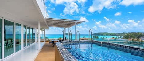 Outdoor pool, open 10:00 AM to 10:00 PM, sun loungers