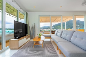 Penthouse 2-Bedroom Suite with Sea View | Living area | 24-inch Smart TV with cable channels, TV - Kata Hill Sea View Hotel (Karon)