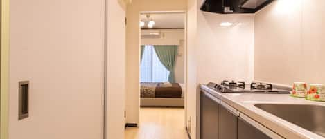 Standard Double Room | Private kitchenette | Fridge, microwave, electric kettle