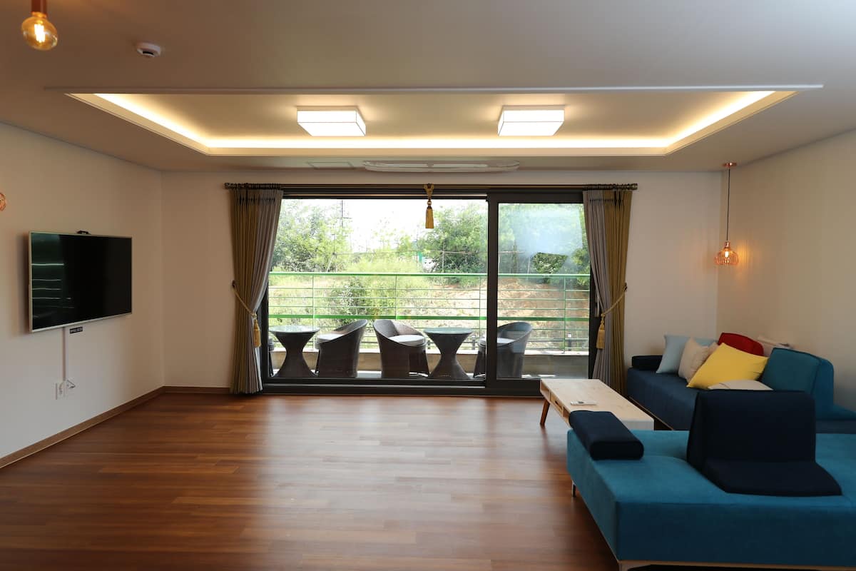 Desk, laptop workspace, blackout curtains, free WiFi