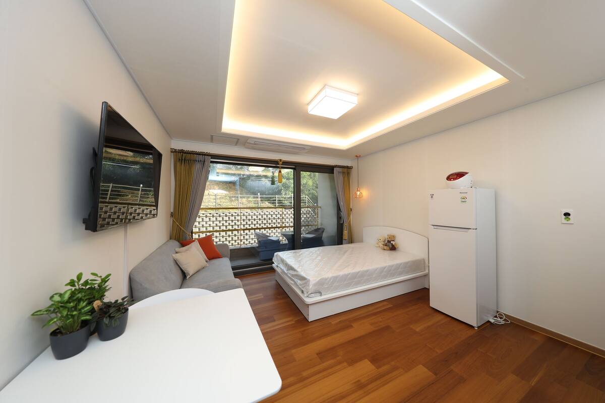 Desk, laptop workspace, blackout curtains, free WiFi