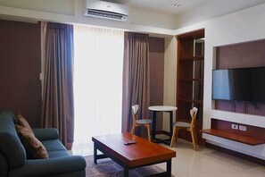 Family Room | In-room safe, blackout drapes, free WiFi, bed sheets