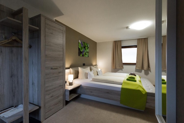 Blackout curtains, free cots/infant beds, free WiFi, bed sheets