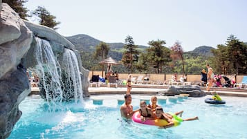 Seasonal outdoor pool, pool umbrellas, pool loungers