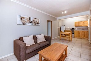 Apartment (Lodge 10) | Living area | TV - Dalberry Guest House (Sandton)
