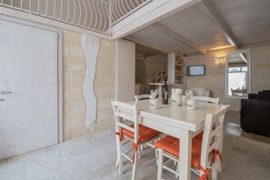 Apartament, 1 dormitori, no fumadors | Zona de menjador de l'habitació