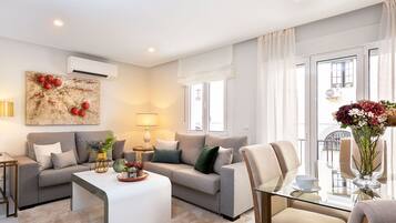 Apartment (2 Bedrooms) | Living area | 32-inch TV with cable channels