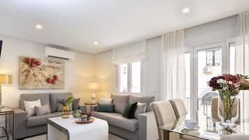 Apartment (2 Bedrooms) | Living area | 32-inch TV with cable channels