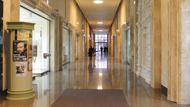 A long, polished corridor with marble walls and a central walkway. - 7 Days City Hotel (Dnipro)