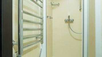 Shower, free toiletries, hair dryer, slippers