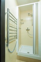 Shower, free toiletries, hair dryer, slippers