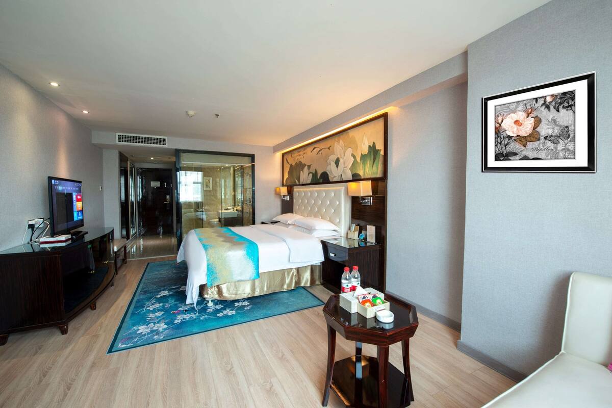 Habitación Deluxe, 1 cama de matrimonio grande, fumadores | Minibar, caja fuerte, escritorio y wifi gratis