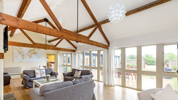 Cottage (10 Bedrooms) | Living area | Fireplace - Classic Cotswolds Barn Conversions by the river (Bampton)