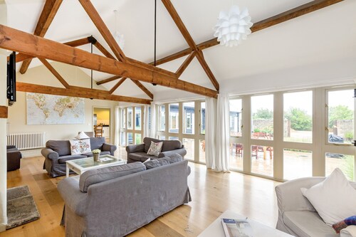 Classic Cotswolds Barn Conversions by the river