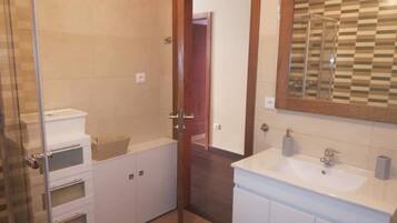 Hair dryer, towels, soap, toilet paper