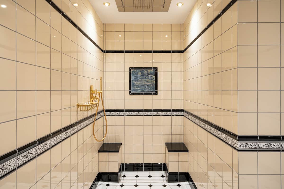 exclusive suite | bathroom | designer toiletries, hair dryer, bathrobes, slippers