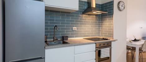 Departamento estándar, 1 habitación | Cocineta privada | Refrigerador, horno, parrilla de estufa y tostadora