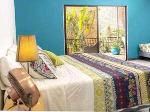 Apartamento, 4 quartos | Cortinas blackout, ferros/tábuas de passar roupa, Wi-Fi de cortesia