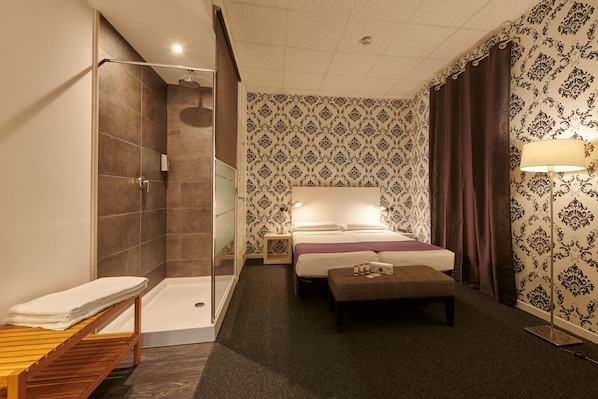 Quartos à prova de som, Wi-Fi de cortesia, roupa de cama