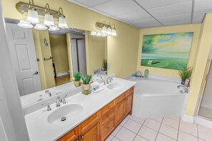 Condo, Multiple Beds, Balcony, Ocean View (Emerald Beach Resort 2025) | Bathroom | Hair dryer, towels, toilet paper