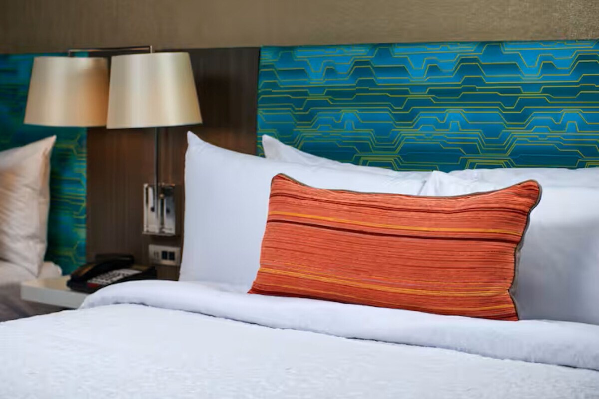 Premium bedding, pillowtop beds, desk, blackout drapes