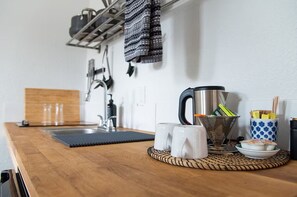 Queen Kitchenette | Private kitchen | Fridge, coffee/tea maker, electric kettle, freezer - The Nightingale Motel (Pagosa Springs)