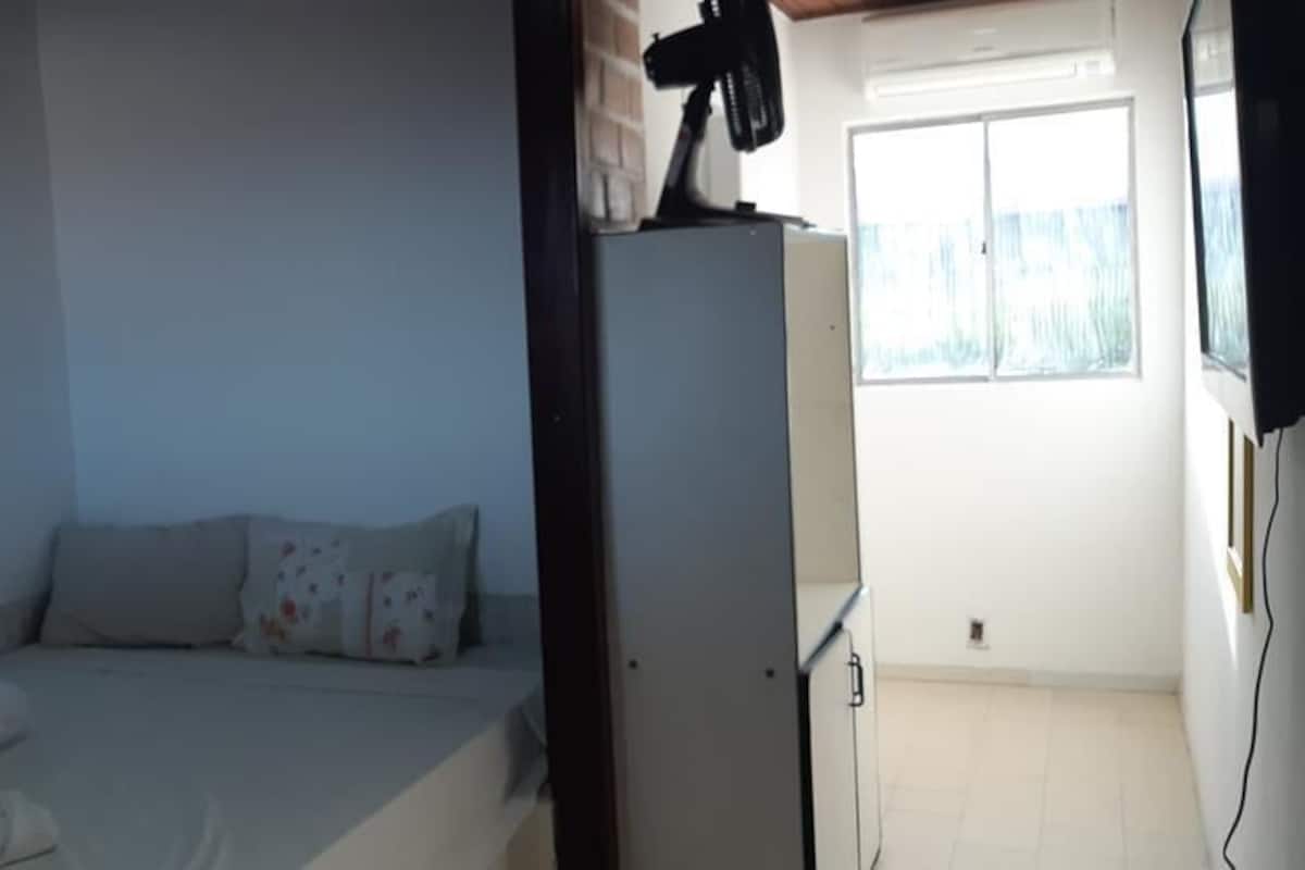 Suite familiar | Minibar y ropa de cama