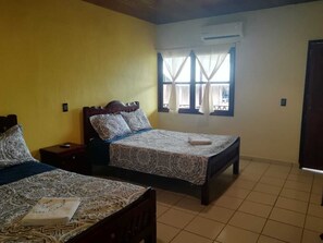 Desk, laptop workspace, bed sheets, wheelchair access