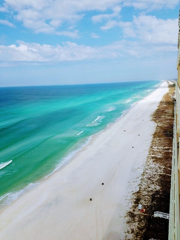 On the beach, sun-loungers, beach towels
