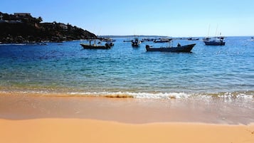 Beach nearby, white sand, 10 beach bars