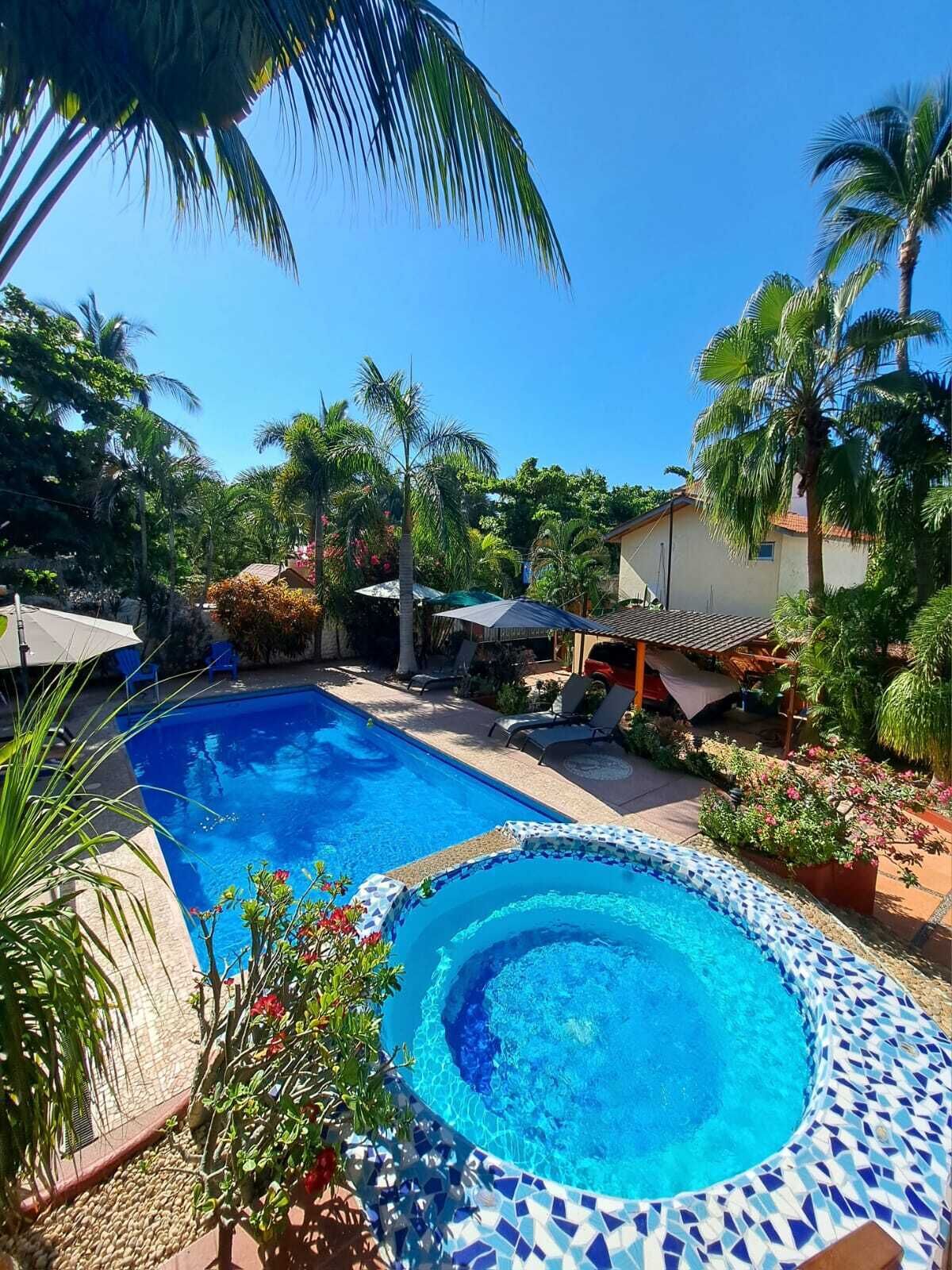 Outdoor pool, open 7:30 AM to 10:00 PM, pool umbrellas, sun loungers