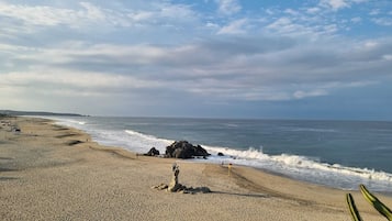 Beach nearby, white sand, 10 beach bars