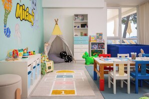 A child's playroom with a tent, toys, and a bookshelf. - Bellevue Maradiso Village by Aminess (Orebic)
