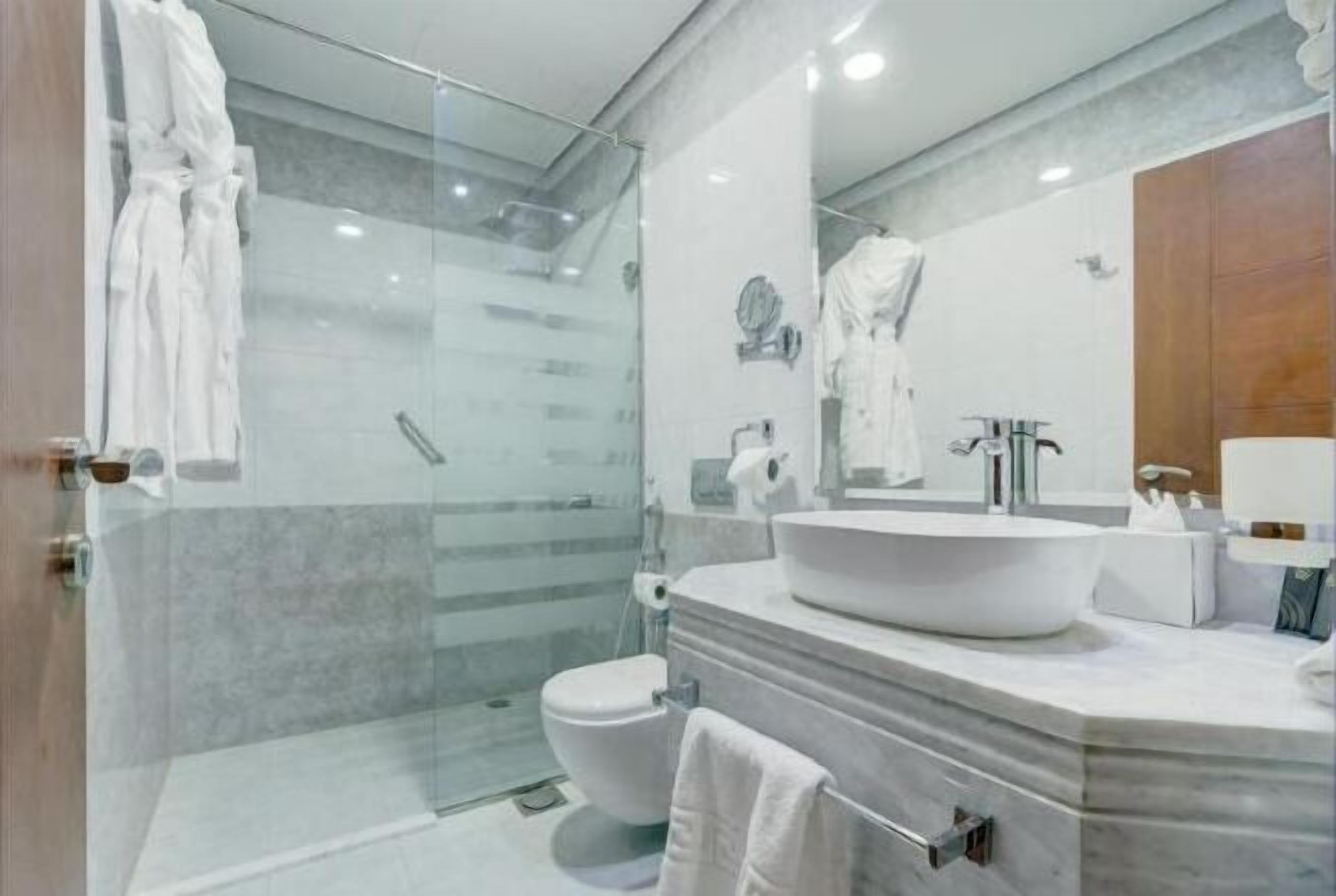 Bathroom | Shower, rainfall showerhead, bathrobes, slippers