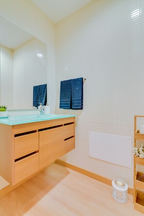 Hair dryer, towels, soap, shampoo