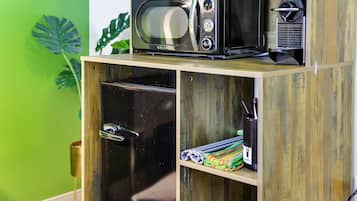 Standard Room, Multiple Beds, Private Bathroom (Self check-in) | Desk, laptop workspace, blackout curtains, iron/ironing board