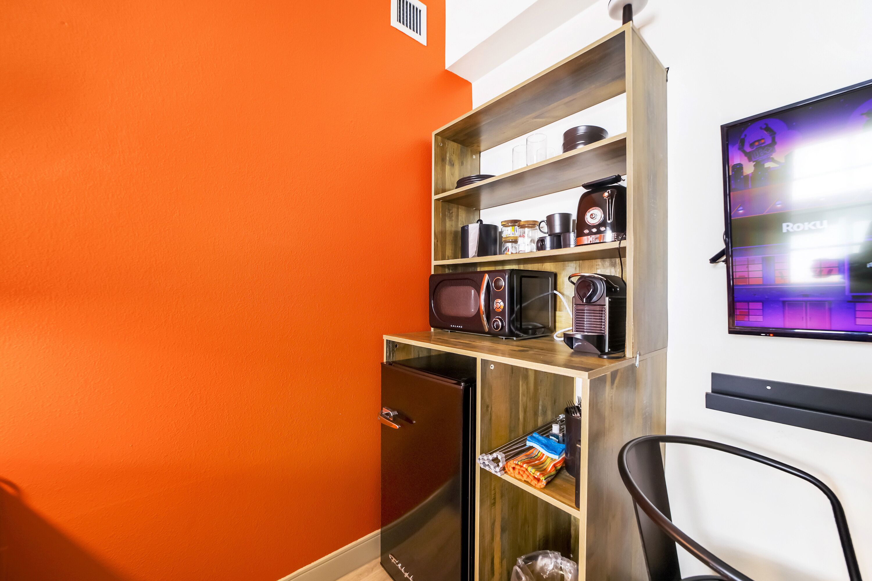 Desk, laptop workspace, blackout curtains, iron/ironing board