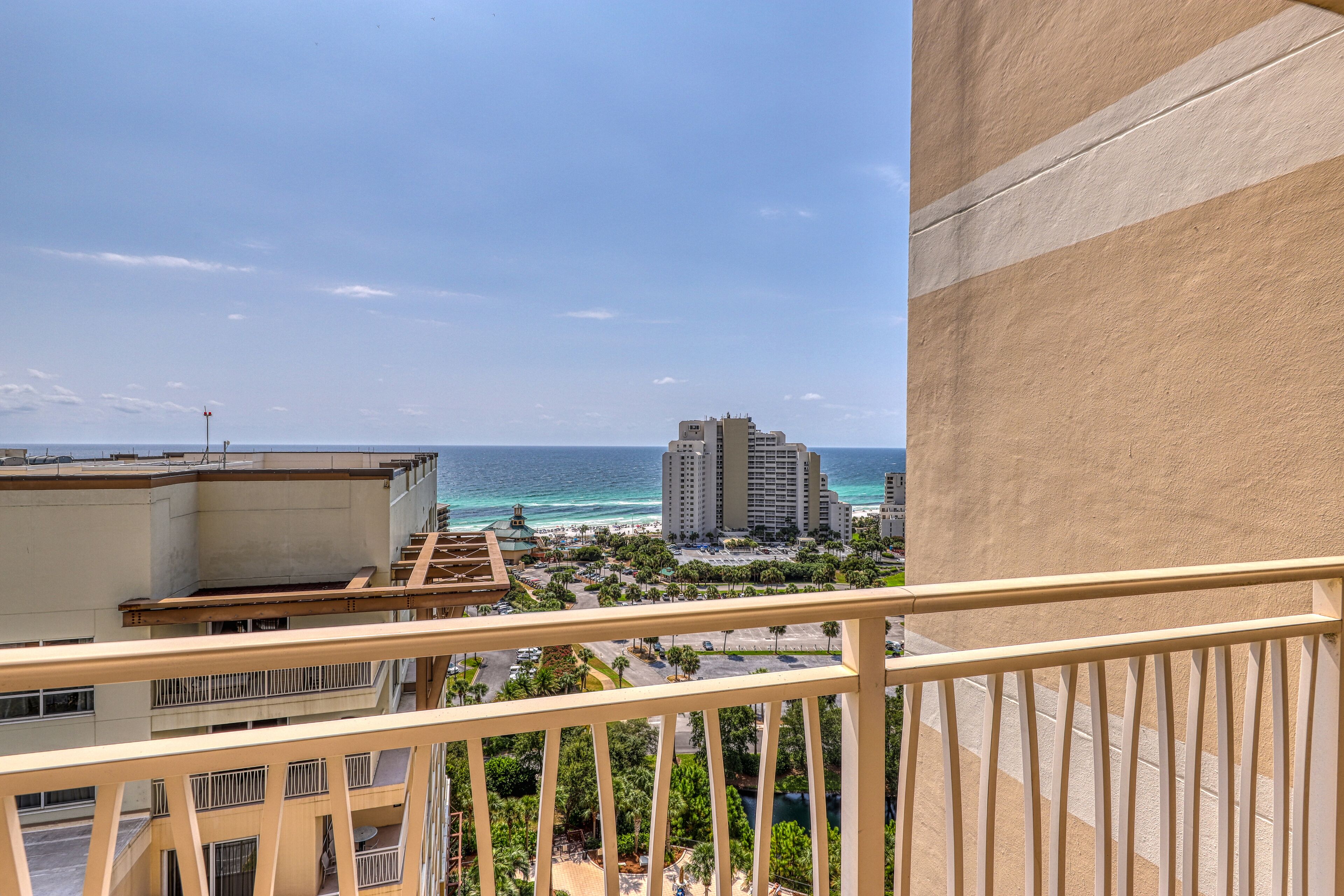 Gulf-view condo w/ corner balcony, shared pool, hot tub & easy beach access
