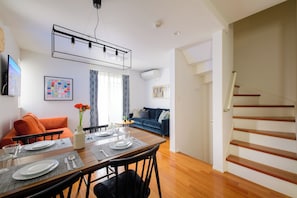 Ferienhaus (Private Vacation) | Wohnbereich | Flachbildfernseher