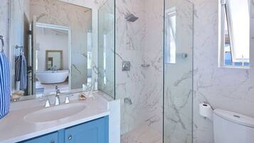 Bathtub, hair dryer, towels