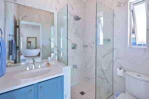 Bathtub, hair dryer, towels