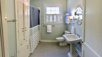 Combined shower/tub, hair dryer, towels, soap