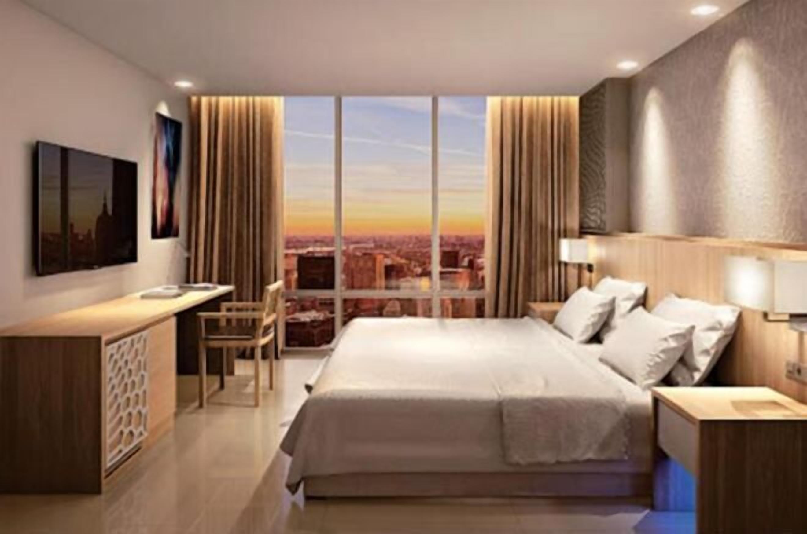 Meja kerja, tirai kedap cahaya, setrika/meja setrika, dan Wi-Fi gratis