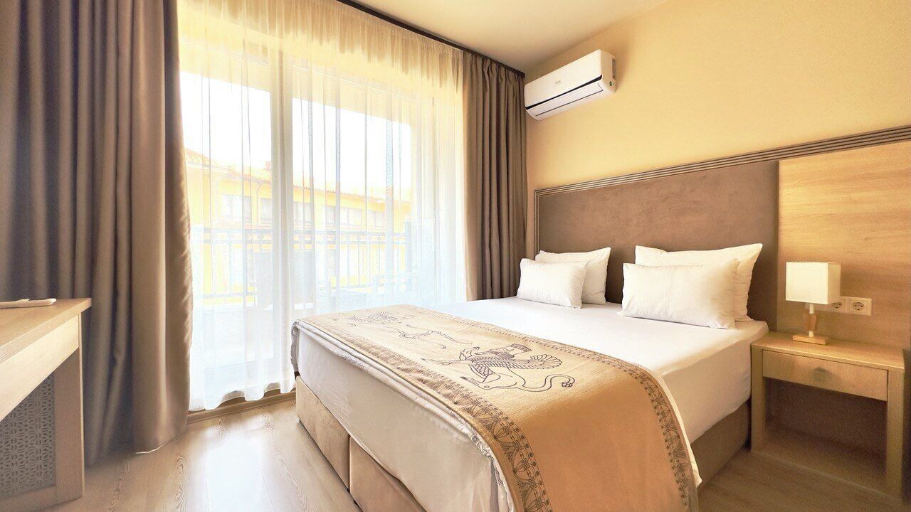 Premium bedding, memory-foam beds, in-room safe, desk