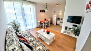 Apartamento | Zona de estar | Una televisión de pantalla plana